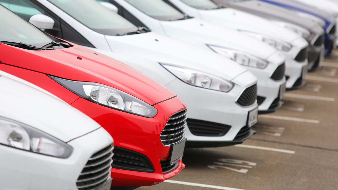 Fleet of Ford Fiesta and Focus models parked in a row