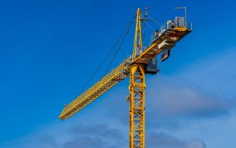 Yellow Crane - Yellow Tower Crane at a Hill development Cambridge from Falcon Tower Crane Services. Falcon are the UK’s largest tower crane supplier.