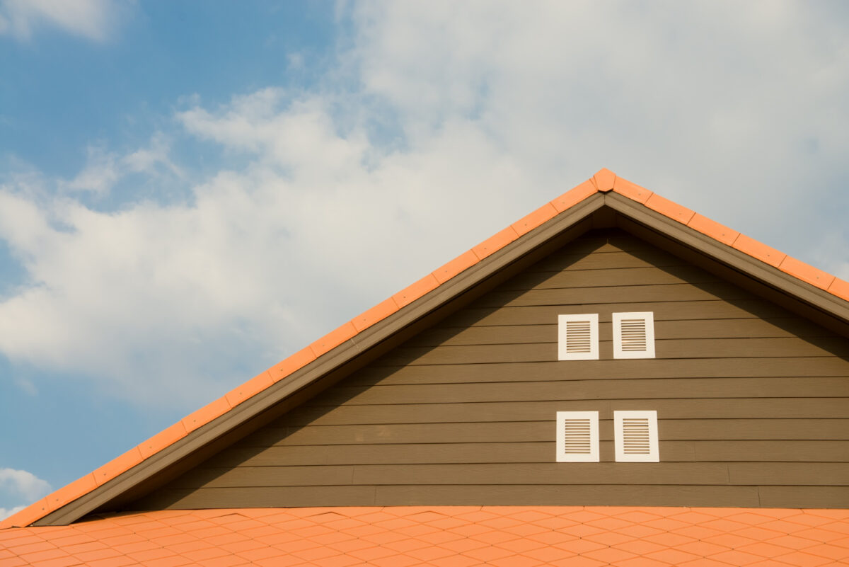 new-brick-house-with-modular-chimney-stone-coated-metal-roof-tile-plastic-windows-rain-gutter